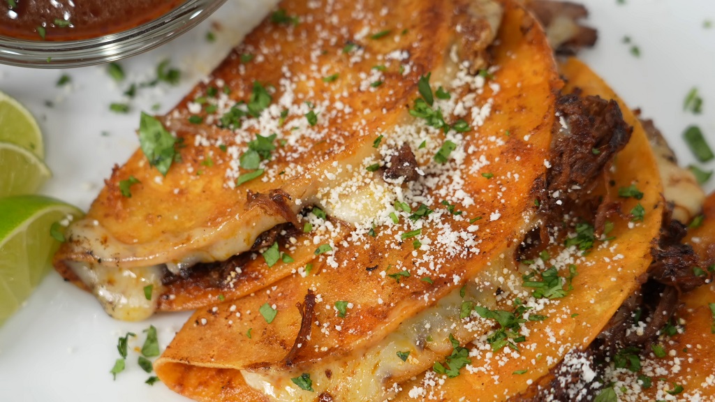 Prepared and served birria tacos