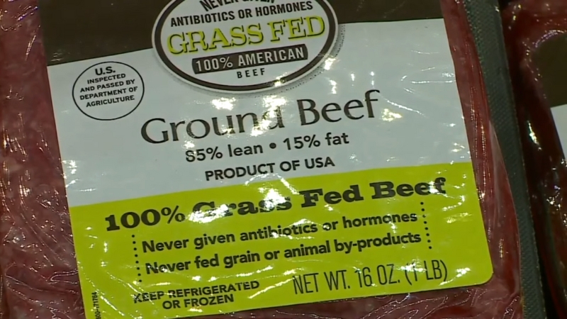 A sealed pack of ground beef shows the label clearly,